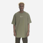 Bombažna kratka majica Karl Kani zelena barva - zelena. Kratka majica iz kolekcije Karl Kani, izdelana iz elastične pletenine. Model iz izjemno udobne bombažne tkanine.