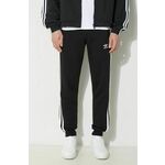 Spodnji del trenirke adidas Originals 3-Stripes Pant črna barva, IU2353 - črna. Spodnji del trenirke iz kolekcije adidas Originals. Model izdelan iz pletenine z aplikacijo. Model z mehko oblazinjeno notranjostjo zagotavlja mehkobo in povečuje udobje.