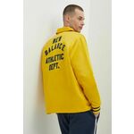 Srajčna jakna New Balance rumena barva, MJ41553GGL - rumena. Srajčna jakna iz kolekcije New Balance. Nepodložen model, izdelan iz blaga z aplikacijo.