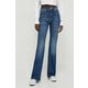Kavbojke Tommy Jeans ženski - modra. Kavbojke iz kolekcije Tommy Jeans flare kroja, z visokim pasom. Model izdelan iz zelo prilagodljivega in udobnega denima.