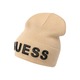 Kapa s primesjo volne Guess bež barva - bež. Kapa iz kolekcije Guess. Model izdelan iz pletenine z nalepko.