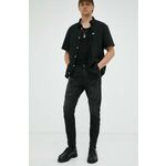 Kavbojke G-Star Raw moški - črna. Kavbojke iz kolekcije G-Star Raw v kroju skinny, z normalnim pasom. Model izdelan iz enobarvnega denima.